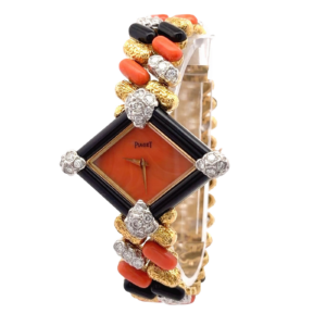 Piaget Yellow gold and Diamond Onyx & Coral